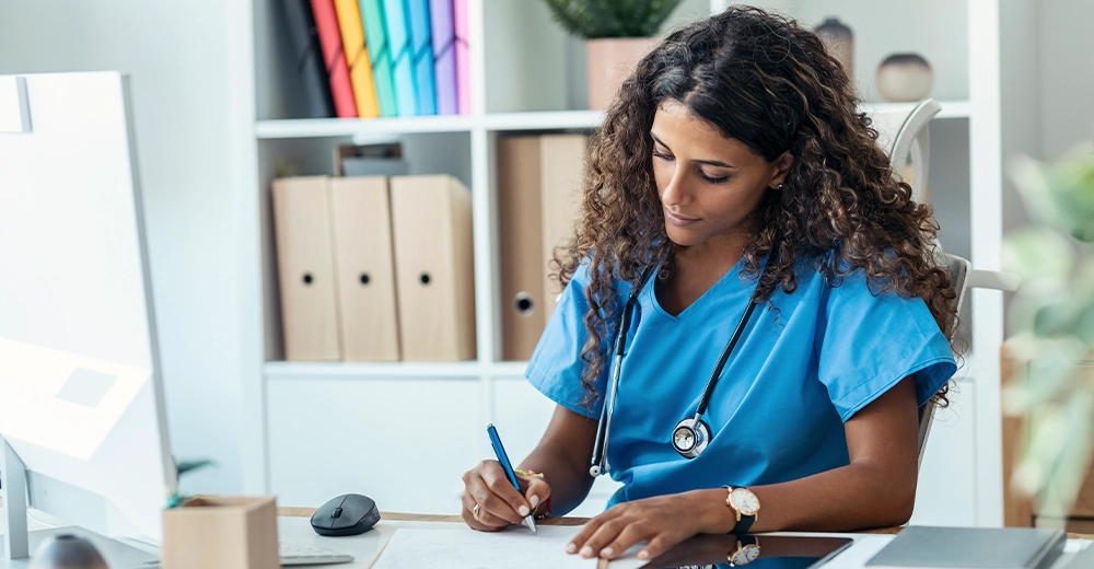Provider reviewing paperwork
